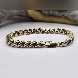 Elegant Sterling Silver Gold Twisted Bracelet